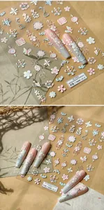 5D embossed nail stickers featuring intricate floral embroidery patterns in pastel colors