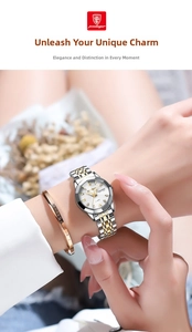 Close-up of a two-tone steel women's watch with rhinestones and a Forever Love bracelet