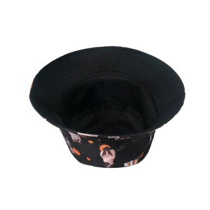 Reversible bucket hat with cute cat print and orange polka dots on black cotton fabric