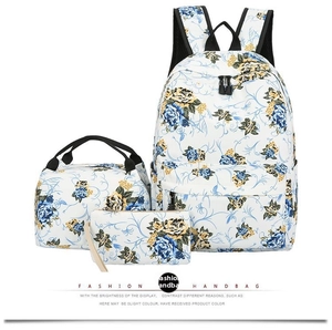 Three-piece floral backpack set featuring a large rucksack, lunch bag, and pencil case