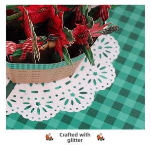 Detailed close-up of 3D Christmas flower basket card with festive glitter powder finish