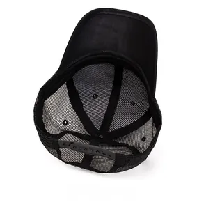 Detail view of the black mesh trucker hat interior with adjustable plastic snap closure