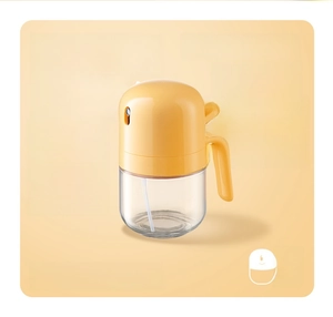 Kitchen glass oil sprayer bottle with ergonomic handle for precise cooking and oil control.