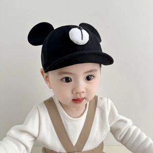 Close-up of baby baseball cap with 3D bear ears and cute cartoon face detail
