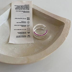 Minimalist S925 sterling silver ring featuring pink zircons in a light stone tray