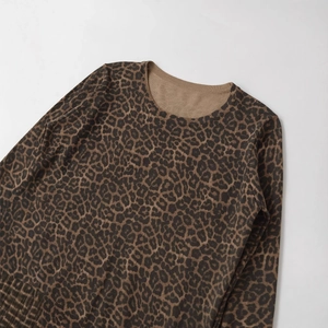 Classic leopard print long sleeve knit sweater with ribbed crew neck and cuffs