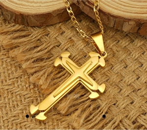 Detail of double-layer gold cross pendant with eco-friendly plating and polished finish