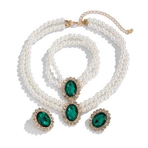 3-piece vintage pearl jewelry set featuring emerald green gems and rhinestone accents