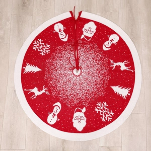 Jupe de sapin de Noël tricotée rouge et blanche avec motifs de Père Noël et rennes