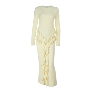 Detail of light yellow ribbed knit dress featuring a double-layered ruffled hem design