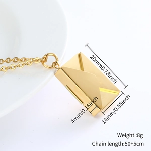 Detailed view of 18k gold heart-opening book pendant with exact size and weight specs
