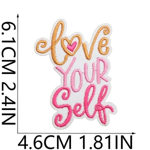 Detailed view of Love Yourself embroidered patch showing dimensions 6.1cm by 4.6cm