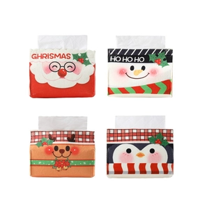 Christmas tissue box covers featuring Santa, Snowman, Deer and Penguin cartoon designs
