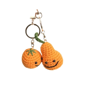 Portachiavi all'uncinetto fatti a mano a forma di frutta con simpatiche facce sorridenti
