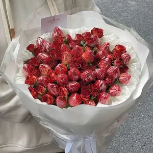 DIY Christmas strawberry and rose bouquet with elegant white artistic gift wrapping