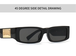 Detail of black rectangular sunglasses with gold metal plate and rivets on the temple