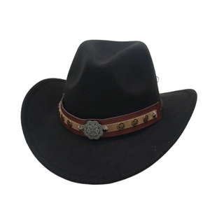 Classic black felt cowboy hat featuring vintage metal star and floral badge band