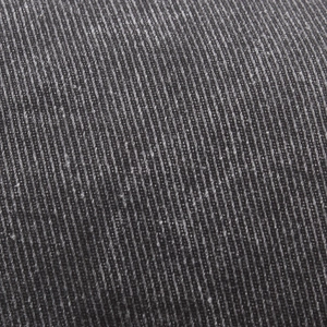 Macro detail of the dark gray twill weave fabric on the washed cotton newsboy hat