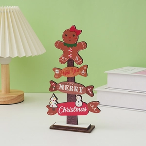 Wooden Christmas tabletop tree with gingerbread man and Merry Christmas text decor