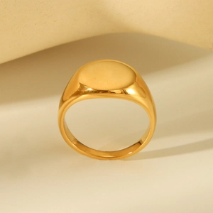Minimalist gold-plated stainless steel signet ring with a polished oval flat surface