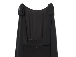 Detail of black sleeveless bodysuit featuring chiffon bow shoulder straps and back zipper