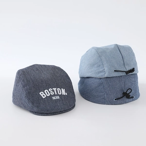 Toddler Boston denim newsboy caps in dark and medium blue with elastic adjusters