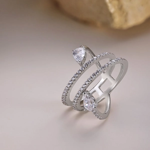Detail of S925 silver ring featuring pear-cut zircons and pave-set micro stones