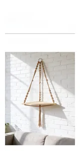 Detail of hand-woven ropes and natural wood shelves on a white brick wall for home decor