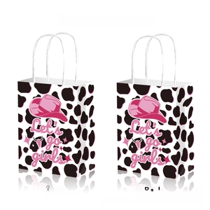 Double-sided cow print gift bag with pink cowgirl hat and Let's go girls slogan