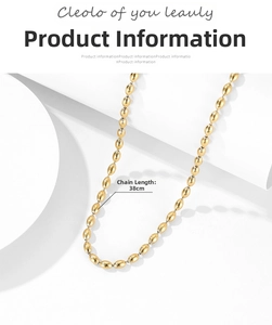 Detail view of 38cm gold beaded chain necklace with polished oval metallic beads