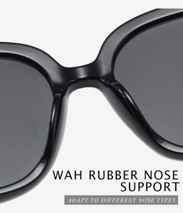 Detail of comfortable rubber nose pads on black sunglasses for various nose shapes
