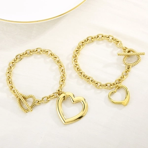 Elegant gold titanium steel heart charm bracelets with OT toggle clasps for women