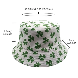 White bucket hat with green shamrock prints featuring size measurements for head 56-58cm