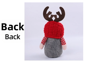 Back view of a Christmas gnome doll with a red knit hat and brown reindeer antlers