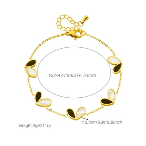 Bracelet chaîne en acier doré avec breloques cœurs noir et blanc et mesures de taille
