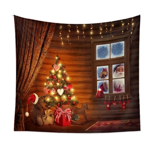 Detail of Christmas tapestry featuring tree, gifts and Santa looking through the window