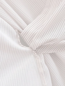 Macro shot of vertical striped fabric with twist detail and high-quality cotton texture