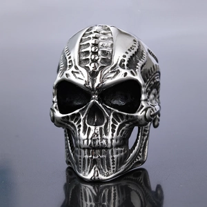 Gothic punk silver skull ring for men, vintage biker style with detailed bone texture