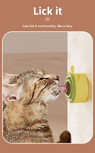 Wall-mounted rotating catnip ball toy showing a cat licking the yellow catnip treat