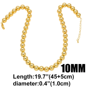 Close-up of 10mm golden beads necklace showing adjustable lobster clasp and sizing details