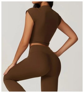 Rear view of brown high-stretch compression yoga set with short sleeve crop top and leggings
