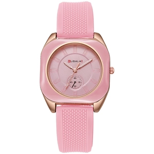 Detail of GUSALAI pink silicone watch band and square rose gold case with dial texture