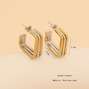 Detail view of geometric square hoop earrings in gold and silver stainless steel