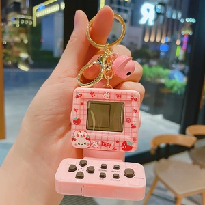 Mini console di gioco tetris rosa portachiavi con motivo a coniglio e campanello d'oro