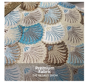 Detailed macro shot of premium jacquard fabric texture with wave patterns and blue silk threads