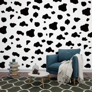 Irregular black and white cow print wall stickers for nursery and kids room wall decor.