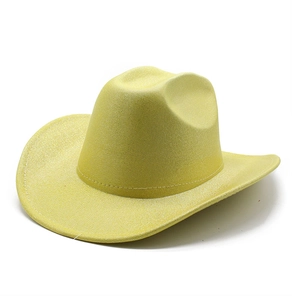 Detail of bright yellow cowboy hat with shimmering glitter texture and wide brim for parties