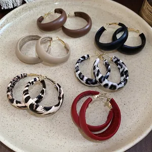 Set of six pairs of geometric leather hoop earrings with leopard and zebra patterns