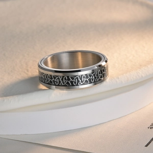 Men's Viking Celtic knot spinner ring in silver and black polished stainless steel