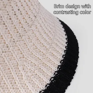 Women's chic cream knitted sun hat with black contrast brim and breathable texture